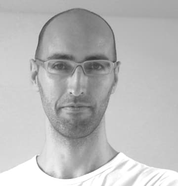 Black and white headshot of J. Paul Neeley